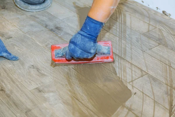 Cleaning tile floor from dust